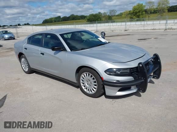 2020 Dodge Charger Police z VIN 2C3CDXKTXLH124217, wystawiony jako IAAI lot #43154620 z przebiegiem 119 464 mil mil oraz . Historia ofert i sprzedaży dostępna na DreamBid. Obrazek 1.