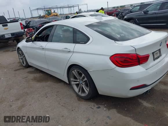 2019 BMW 4 Series 430i with VIN WBA4J1C53KBM14633, listed as a IAAI auction lot 42274320 with 70,460 mi miles and . Bid and sale history available at DreamBid. Image 3.