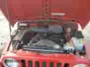 1998 Jeep Wrangler SE with VIN 1J4FY29P9WP736055, listed as a Copart auction lot 66898815 with 84,686 mi miles and Clean title. Bid and sale history available at DreamBid. Image 12.