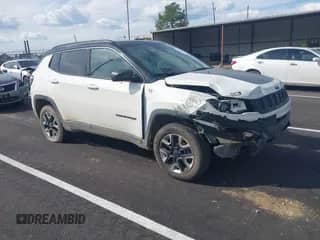 2017 Jeep Compass Trailhawk z VIN 3C4NJDDBXHT575582, wystawiony jako IAAI lot #43325377 z przebiegiem 147 189 mil mil oraz . Historia ofert i sprzedaży dostępna na DreamBid. Obrazek 1.