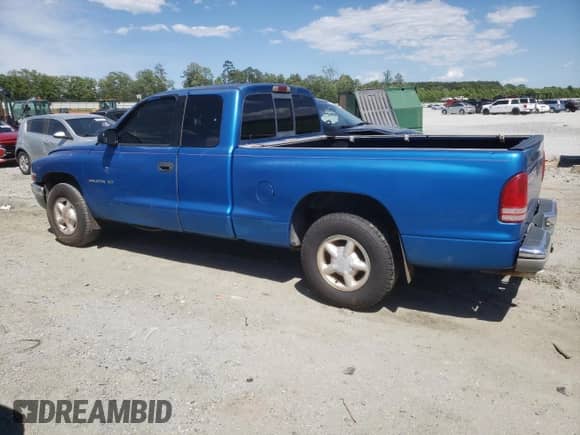 1999 Dodge Dakota SLT with VIN 1B7GL22XXXS147047, listed as a Copart auction lot 57552215 with 288,196 mi miles and Salvage title. Bid and sale history available at DreamBid. Image 2.