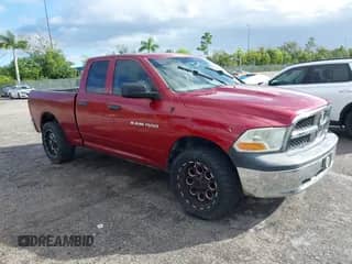 2012 Ram 1500 ST z VIN 1C6RD6FK7CS200462, wystawiony jako IAAI lot #43546724 z przebiegiem 232 374 mil mil oraz . Historia ofert i sprzedaży dostępna na DreamBid. Obrazek 1.