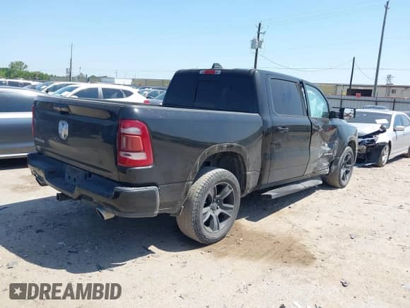 2019 Ram 1500 Laramie with VIN 1C6RREJT9KN558591, listed as a IAAI auction lot 41988500 with 174,172 mi miles and . Bid and sale history available at DreamBid. Image 4.