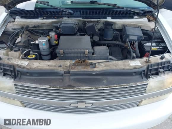 1997 Chevrolet Astro z VIN 1GNDM19W1VB158532, wystawiony jako IAAI lot #42903651 z przebiegiem 121 360 mil mil oraz . Historia ofert i sprzedaży dostępna na DreamBid. Obrazek 10.