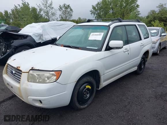 2007 Subaru Forester X with VIN JF1SG65667H710736, listed as a IAAI auction lot 43244105 with 199,681 mi miles and . Bid and sale history available at DreamBid. Image 2.