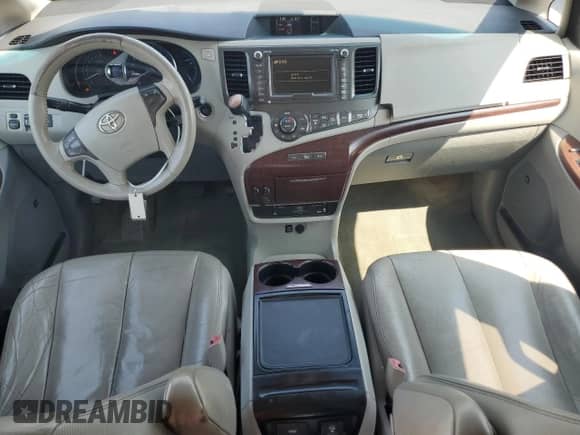 2012 Toyota Sienna XLE with VIN 5TDYK3DC8CS176623, listed as a Copart auction lot 80257225 with 262,472 mi miles and Salvage title. Bid and sale history available at DreamBid. Image 8.