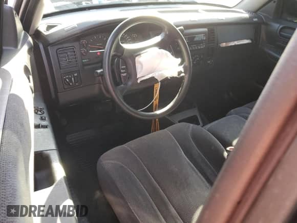2003 Dodge Dakota SLT z VIN 1D7HG42N93S363166, wystawiony jako Copart lot #72176534 z przebiegiem 189 834 mil mil oraz Szkoda całkowita • Salvage title. Historia ofert i sprzedaży dostępna na DreamBid. Obrazek 8.