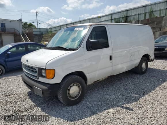 2002 Ford Econoline Cargo with VIN 1FTRE14202HA70502, listed as a Copart auction lot 65346325 with 195,220 mi miles and Salvage title. Bid and sale history available at DreamBid. Image 1.