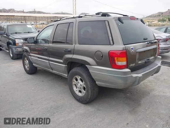 1999 Jeep Grand Cherokee Laredo с VIN 1J4G258S7XC537382, выставлен на аукционе IAAI как лот 42725833 с пробегом 143 240 миль миль и . История ставок и продаж доступна на DreamBid. Изображение 3.