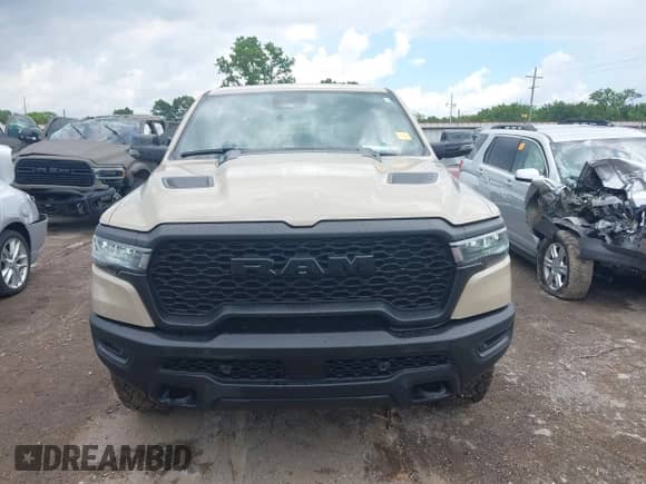 2025 Ram 1500 Rebel z VIN 1C6SRFLP5SN658193, wystawiony jako IAAI lot #42648676 z przebiegiem 11 099 mil mil oraz . Historia ofert i sprzedaży dostępna na DreamBid. Obrazek 13.