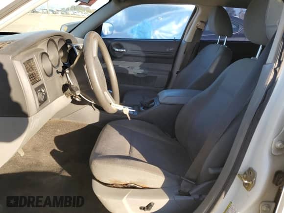 2005 Dodge Magnum SE с VIN 2D4FV48TX5H692873, выставлен на аукционе Copart как лот 87230504 с пробегом 166 497 миль миль и Списание • Salvage title. История ставок и продаж доступна на DreamBid. Изображение 7.