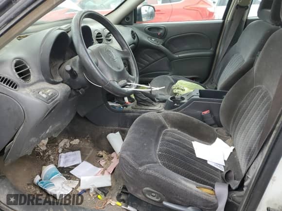 2000 Pontiac Grand Am GT с VIN 1G2NW52E2YM785155, выставлен на аукционе Copart как лот 54650275 с пробегом 210 046 миль миль и Списание • Salvage title. История ставок и продаж доступна на DreamBid. Изображение 7.
