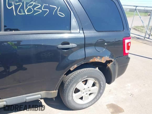 2011 Ford Escape XLT with VIN 1FMCU9DG6BKB40960, listed as a IAAI auction lot 42183576 with 259,427 mi miles and . Bid and sale history available at DreamBid. Image 12.