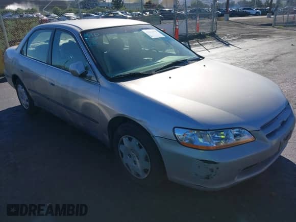 1999 Honda Accord LX with VIN JHMCG6658XC020552, listed as a IAAI auction lot 43553076 with 76,289 mi miles and . Bid and sale history available at DreamBid. Image 1.