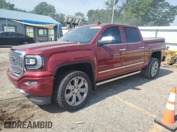 2018 GMC Sierra 1500 Denali with VIN 3GTU2PEJ4JG267256, listed as a Copart auction lot 58923445 with 79,536 mi miles and Salvage title. Bid and sale history available at DreamBid. Image 1.