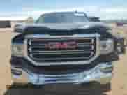 2019 GMC Sierra 1500 SLE with VIN 2GTV2MECXK1127002, listed as a Copart auction lot 61127735 with 63,923 mi miles and Salvage title. Bid and sale history available at DreamBid. Image 5.