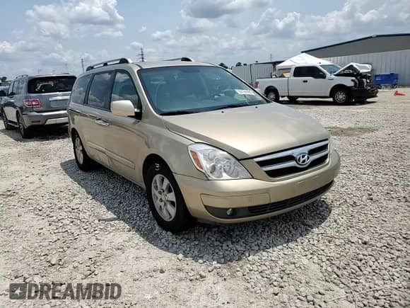 2007 Hyundai Entourage GLS with VIN KNDMC233376033298, listed as a Copart auction lot 68166895 with 154,725 mi miles and Salvage title. Bid and sale history available at DreamBid. Image 14.