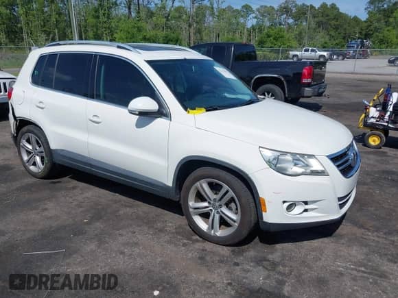 2011 Volkswagen Tiguan S with VIN WVGAV7AX5BW549683, listed as a IAAI auction lot 42131622 with 121,306 mi miles and . Bid and sale history available at DreamBid. Image 1.
