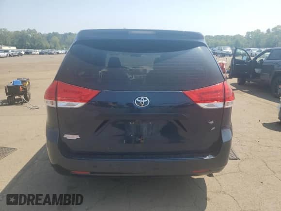 2012 Toyota Sienna with VIN 5TDZK3DC4CS237227, listed as a Copart auction lot 68947005 with 219,993 mi miles and Salvage title. Bid and sale history available at DreamBid. Image 6.