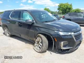 2022 Chevrolet Traverse LS z VIN 1GNEVFKW1NJ121074, wystawiony jako IAAI lot #42776032 z przebiegiem 71 867 mil mil oraz . Historia ofert i sprzedaży dostępna na DreamBid. Obrazek 1.