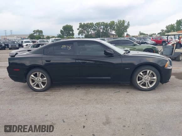 2011 Dodge Charger RT Max with VIN 2B3CM5CT2BH552748, listed as a IAAI auction lot 43028493 with 196,995 mi miles and . Bid and sale history available at DreamBid. Image 13.