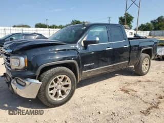 2016 GMC Sierra 1500 SLT with VIN 1GTV2NEC4GZ374973, listed as a Copart auction lot 71717345 with 143,896 mi miles and Salvage title. Bid and sale history available at DreamBid. Image 1.