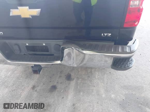 2014 Chevrolet Silverado 1500 LTZ z VIN 1GCVKSEC4EZ120918, wystawiony jako IAAI lot #42791870 z przebiegiem 175 849 mil mil oraz . Historia ofert i sprzedaży dostępna na DreamBid. Obrazek 17.