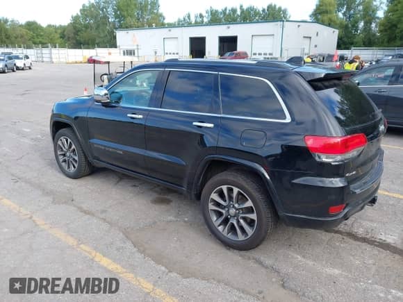 2017 Jeep Grand Cherokee Overland with VIN 1C4RJFCG4HC702073, listed as a IAAI auction lot 43110118 with 130,079 mi miles and . Bid and sale history available at DreamBid. Image 3.
