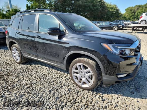 2024 Honda Passport EX-L with VIN 5FNYF8H5XRB013031, listed as a Copart auction lot 67055115 with 11,363 mi miles and Salvage title. Bid and sale history available at DreamBid. Image 4.