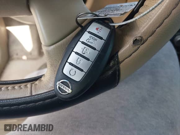 2014 Nissan Pathfinder Platinum z VIN 5N1AR2MM8EC691105, wystawiony jako IAAI lot #42807832 z przebiegiem 187 540 mil mil oraz . Historia ofert i sprzedaży dostępna na DreamBid. Obrazek 11.