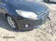 2014 Ford Focus Titanium with VIN 1FADP3J27EL227311, listed as a IAAI auction lot 41904675 with 180,459 mi miles and . Bid and sale history available at DreamBid. Image 12.