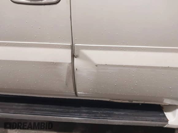 2004 Cadillac Escalade z VIN 1GYEK63N34R167569, wystawiony jako IAAI lot #43490315 z przebiegiem Nie podano mil oraz . Historia ofert i sprzedaży dostępna na DreamBid. Obrazek 12.