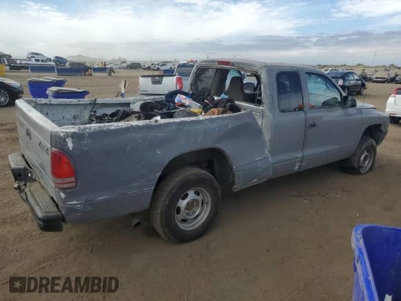 2001 Dodge Dakota with VIN 1B7GG22X21S182371, listed as a Copart auction lot 76330064 with 140,917 mi miles and Non repairable. Bid and sale history available at DreamBid. Image 3.