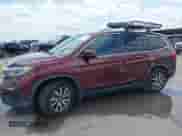 2020 Honda Pilot EX с VIN 5FNYF6H3XLB019034, выставлен на аукционе IAAI как лот 42207607 с пробегом 150 511 миль миль и . История ставок и продаж доступна на DreamBid. Изображение 6.