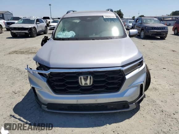 2024 Honda Pilot Touring with VIN 5FNYG2H75RB013840, listed as a Copart auction lot 59626715 with 18,846 mi miles and Salvage title. Bid and sale history available at DreamBid. Image 5.
