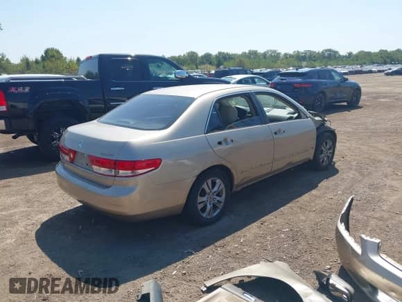 2003 Honda Accord LX with VIN 3HGCM56323G705352, listed as a IAAI auction lot 43196880 with Not provided miles and . Bid and sale history available at DreamBid. Image 4.