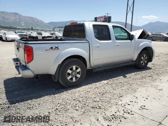 2010 Nissan Frontier Pro-4X с VIN 1N6AD0EV9AC414002, выставлен на аукционе Copart как лот 61584065 с пробегом Не указан миль и Списание • Salvage title. История ставок и продаж доступна на DreamBid. Изображение 3.