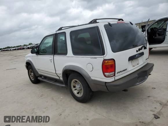 2000 Ford Explorer Sport z VIN 1FMYU60E0YUA70071, wystawiony jako Copart lot #54078615 z przebiegiem 189 103 mil mil oraz Czysty tytuł • Clean title. Historia ofert i sprzedaży dostępna na DreamBid. Obrazek 2.