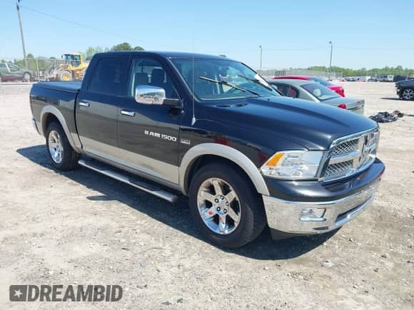 2011 Ram 1500 SLT z VIN 1D7RB1CT9BS628262, wystawiony jako IAAI lot #41980904 z przebiegiem 195 466 mil mil oraz . Historia ofert i sprzedaży dostępna na DreamBid. Obrazek 1.