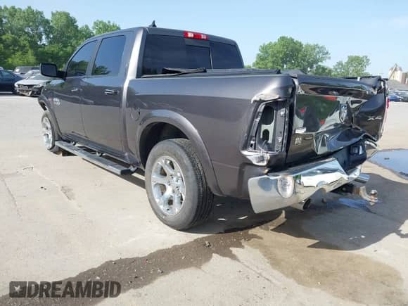 2017 Ram 1500 Laramie z VIN 1C6RR7NT4HS691372, wystawiony jako IAAI lot #42264467 z przebiegiem 135 395 mil mil oraz . Historia ofert i sprzedaży dostępna na DreamBid. Obrazek 3.