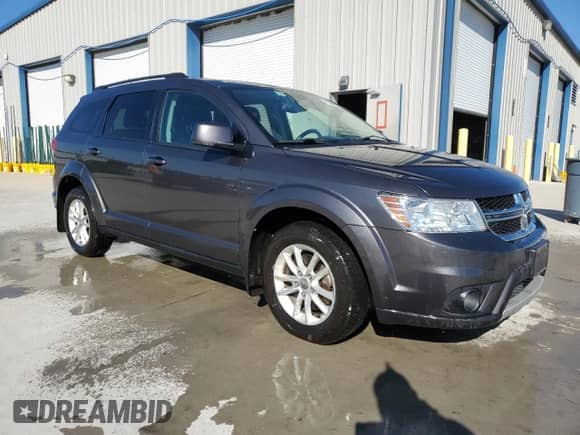 2015 Dodge Journey SXT z VIN 3C4PDDBG0FT569382, wystawiony jako Copart lot #71550295 z przebiegiem 154 117 mil mil oraz Szkoda całkowita • Salvage title. Historia ofert i sprzedaży dostępna na DreamBid. Obrazek 4.