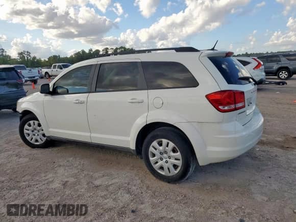 2013 Dodge Journey SE z VIN 3C4PDCABXDT695293, wystawiony jako Copart lot #83797235 z przebiegiem 167 499 mil mil oraz Szkoda całkowita • Salvage title. Historia ofert i sprzedaży dostępna na DreamBid. Obrazek 2.