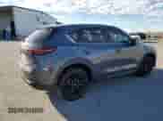2024 Mazda CX-5 S Carbon Edition z VIN JM3KFBCM6R0350318, wystawiony jako Copart lot #85782105 z przebiegiem 30 350 mil mil oraz Szkoda całkowita • Salvage title. Historia ofert i sprzedaży dostępna na DreamBid. Obrazek 3.