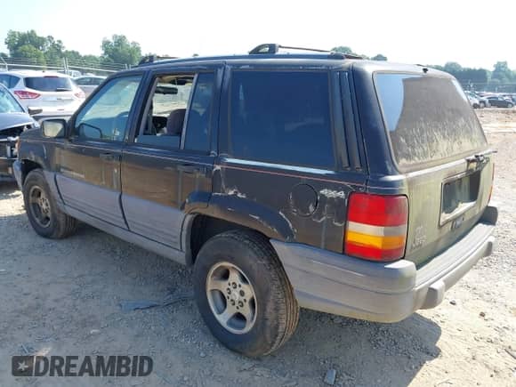 1996 Jeep Grand Cherokee Laredo z VIN 1J4GZ58SXTC280868, wystawiony jako IAAI lot #42653608 z przebiegiem 188 867 mil mil oraz . Historia ofert i sprzedaży dostępna na DreamBid. Obrazek 3.