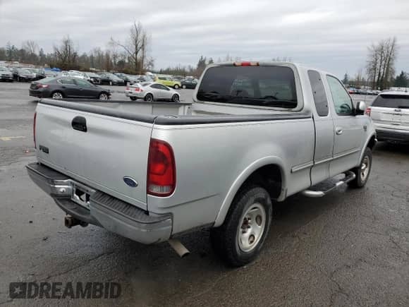 1998 Ford F-150 XL с VIN 1FTDX18W5WKA08829, выставлен на аукционе Copart как лот 85135314 с пробегом 160 824 миль миль и Чистый • Clean title. История ставок и продаж доступна на DreamBid. Изображение 3.