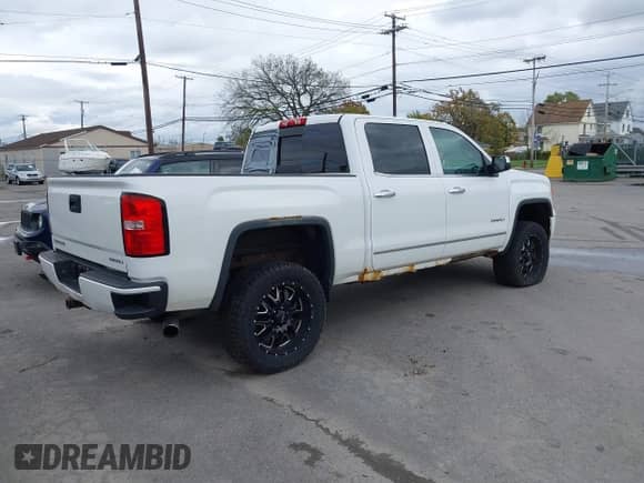 2014 GMC Sierra 1500 Denali z VIN 3GTU2WEJ8EG553336, wystawiony jako IAAI lot #43521471 z przebiegiem 177 785 mil mil oraz . Historia ofert i sprzedaży dostępna na DreamBid. Obrazek 4.