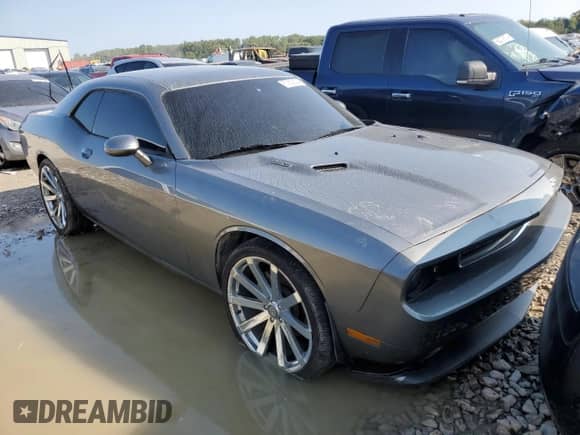 2012 Dodge Challenger R/T with VIN 2C3CDYBT0CH275489, listed as a Copart auction lot 67852624 with 100,406 mi miles and Non repairable. Bid and sale history available at DreamBid. Image 4.