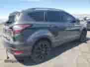 2017 Ford Escape Titanium with VIN 1FMCU9J98HUE57772, listed as a Copart auction lot 80327385 with 49,624 mi miles and Salvage title. Bid and sale history available at DreamBid. Image 3.