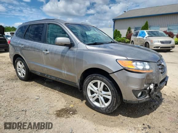 2011 Hyundai Santa Fe Limited с VIN 5XYZK4AG7BG073321, выставлен на аукционе Copart как лот 62773835 с пробегом 203 724 миль миль и Списание • Salvage title. История ставок и продаж доступна на DreamBid. Изображение 4.