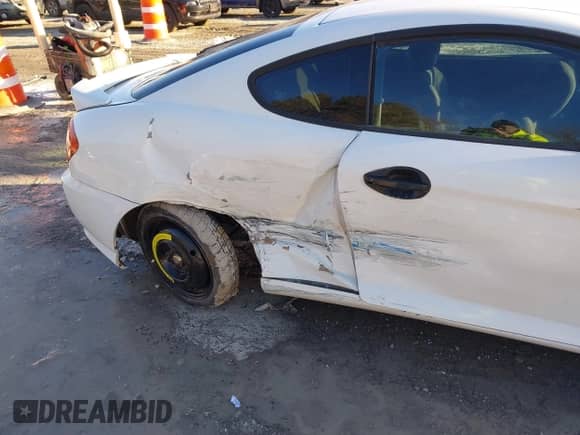 2004 Hyundai Tiburon GS with VIN KMHHM65D94U105300, listed as a IAAI auction lot 41342124 with 229,938 mi miles and . Bid and sale history available at DreamBid. Image 6.